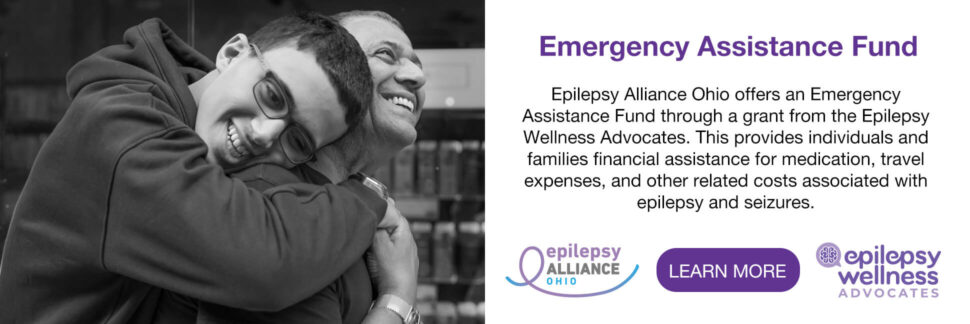 Older boy hugging a man from behind